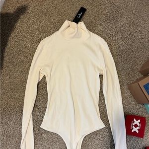 NWT cream long sleeve turtleneck